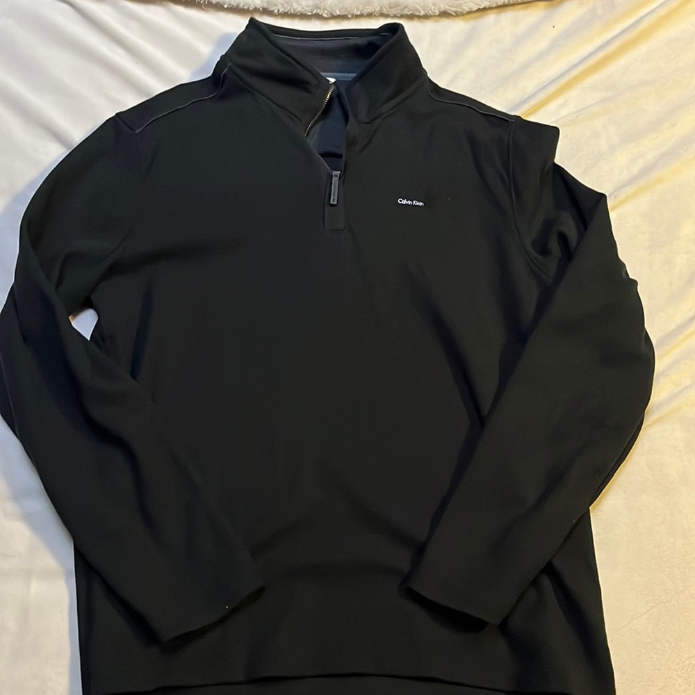 Zip up sweater, nice and warm.
